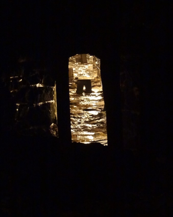 I don't think this was part of the  tour, but I thought it was spooky: looking into a tunnel that runs under the road. Who is the bench for?