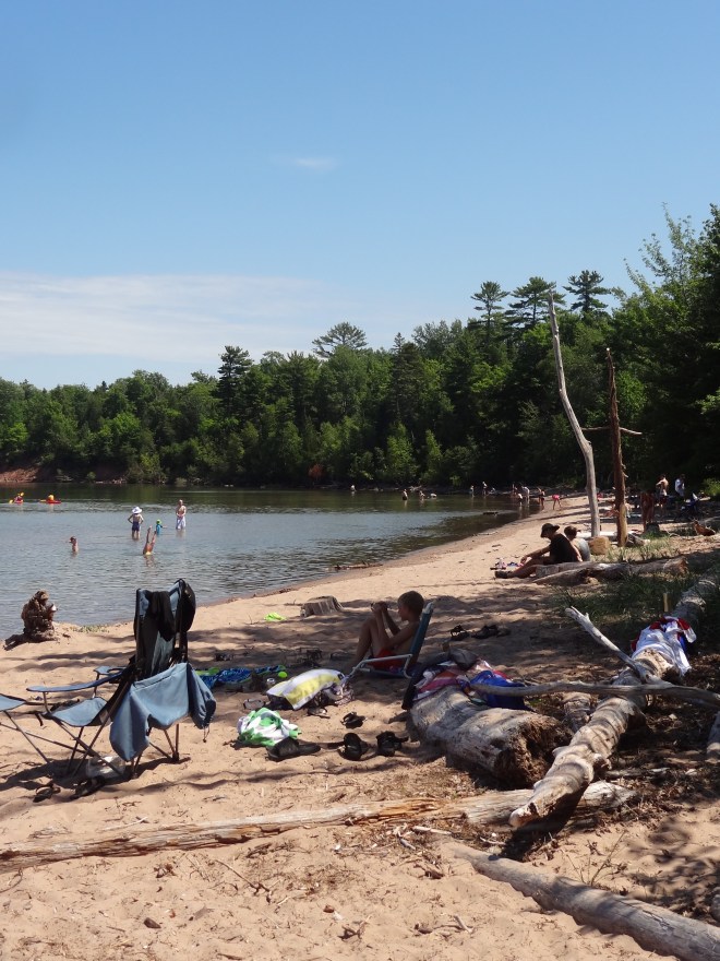 Dozens of swimmers enjoyed the cool waters of Lake Superior. 